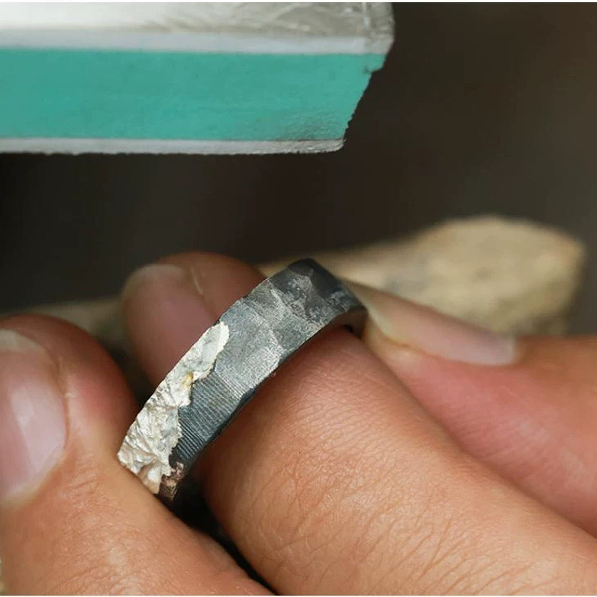 Master Silversmith Hand-Filing Ridge Contours at Artisan Bench