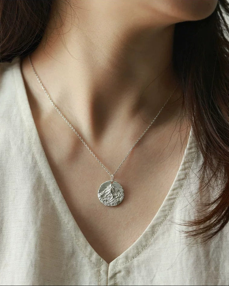 Kailash Peak Relic Pendant worn on model, 55cm S925 silver chain